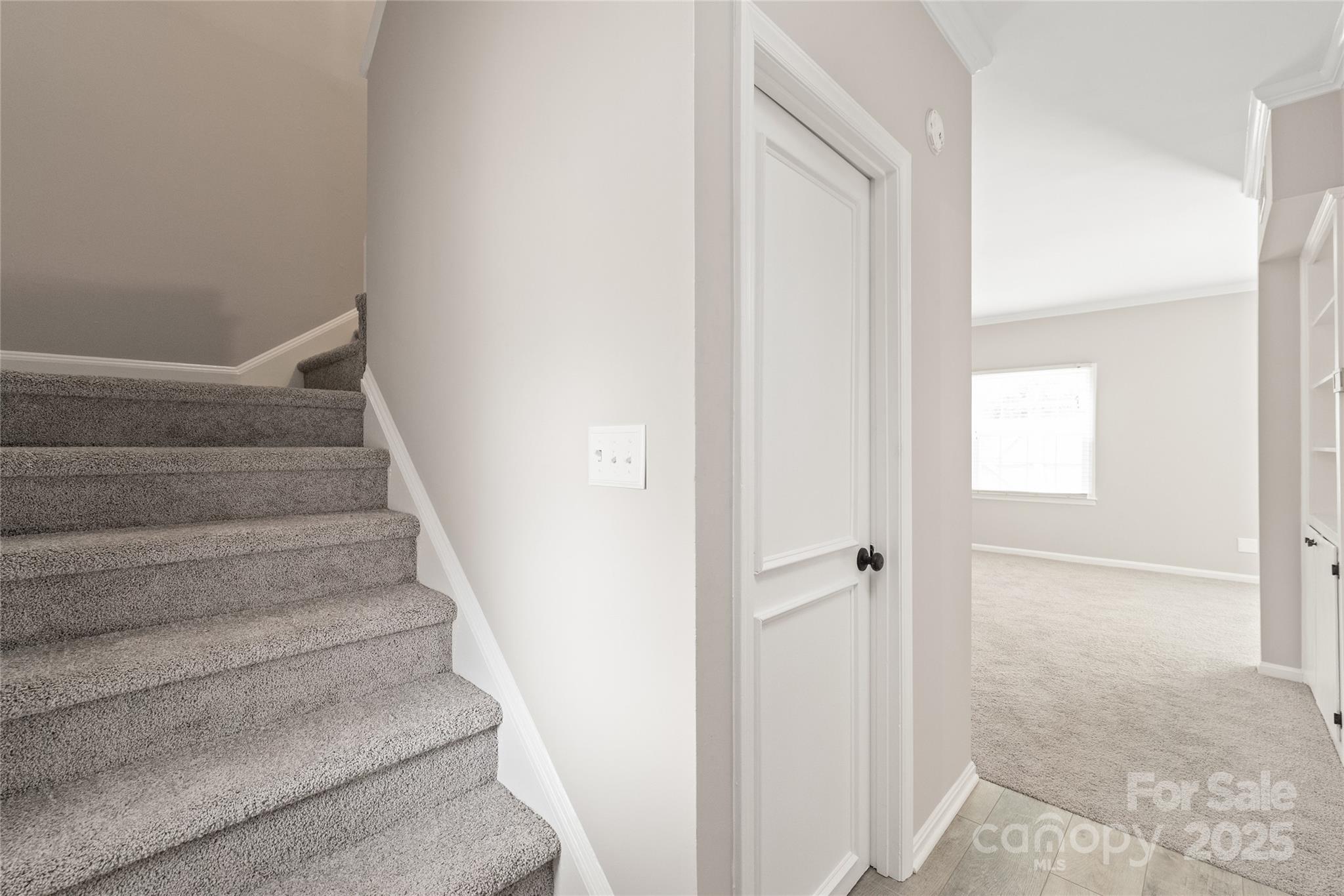 5949 Quail Hollow Road, Unit E Charlotte, NC 28210 - Photo 3 of 27 a view of staircase with white walls