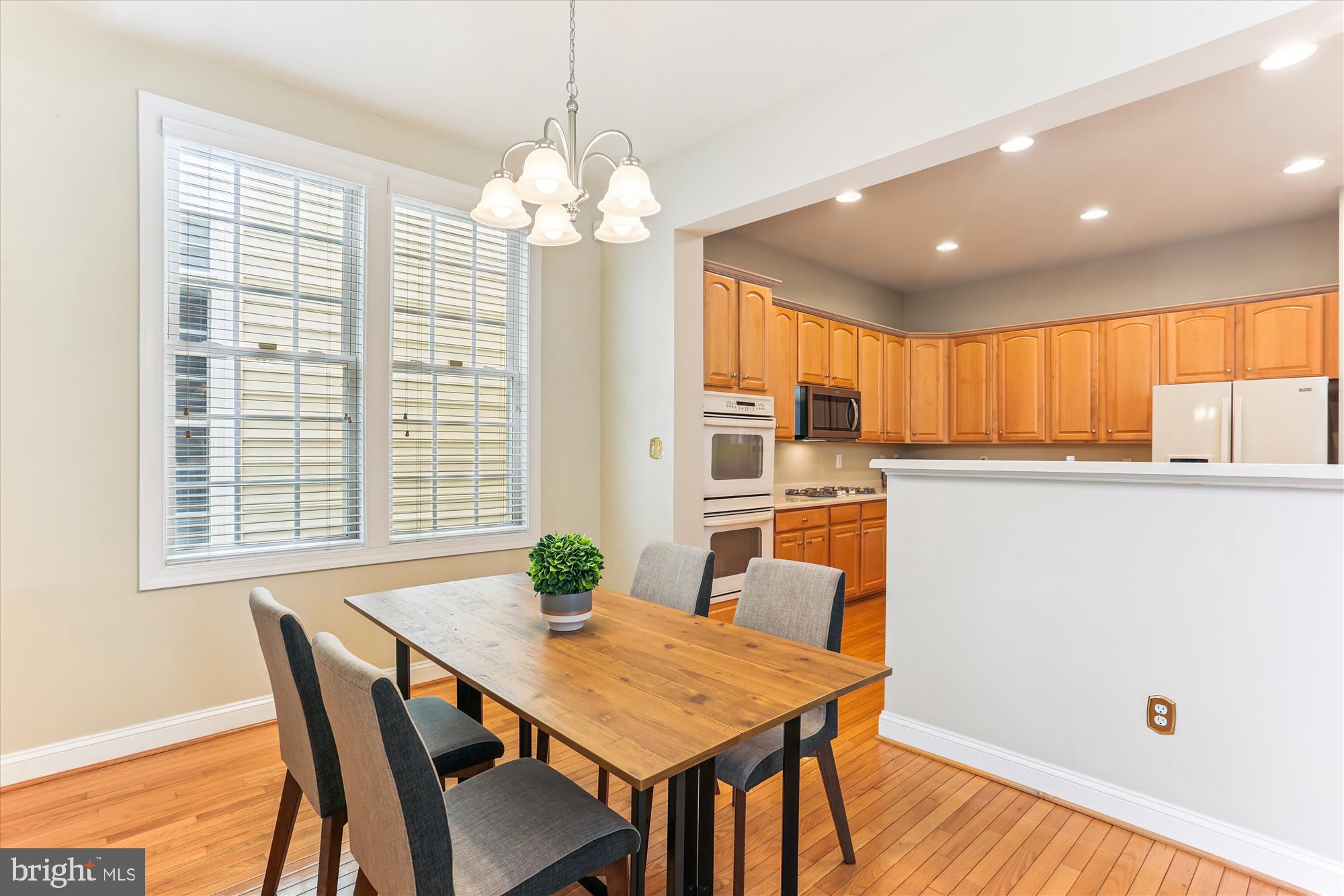 713 Bright Meadow Drive Gaithersburg, MD 20878 - Photo 16 of 54 Breakfast area with hardwood floors