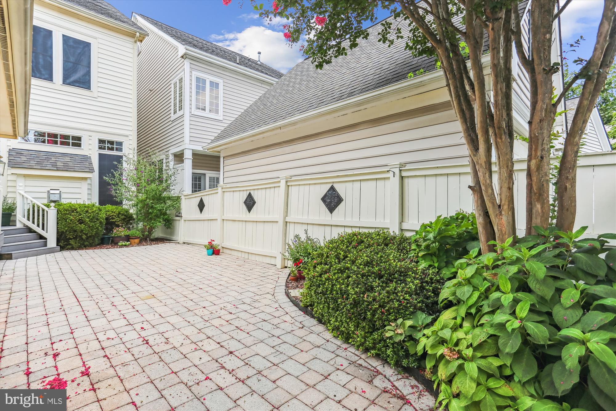 713 Bright Meadow Drive Gaithersburg, MD 20878 - Photo 41 of 54 a front view of a house with garden