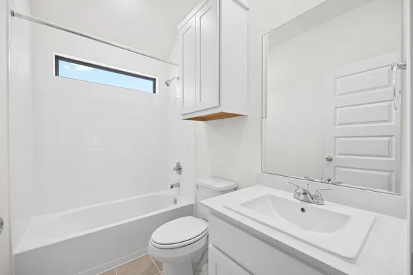 a view of garden with trees in the background