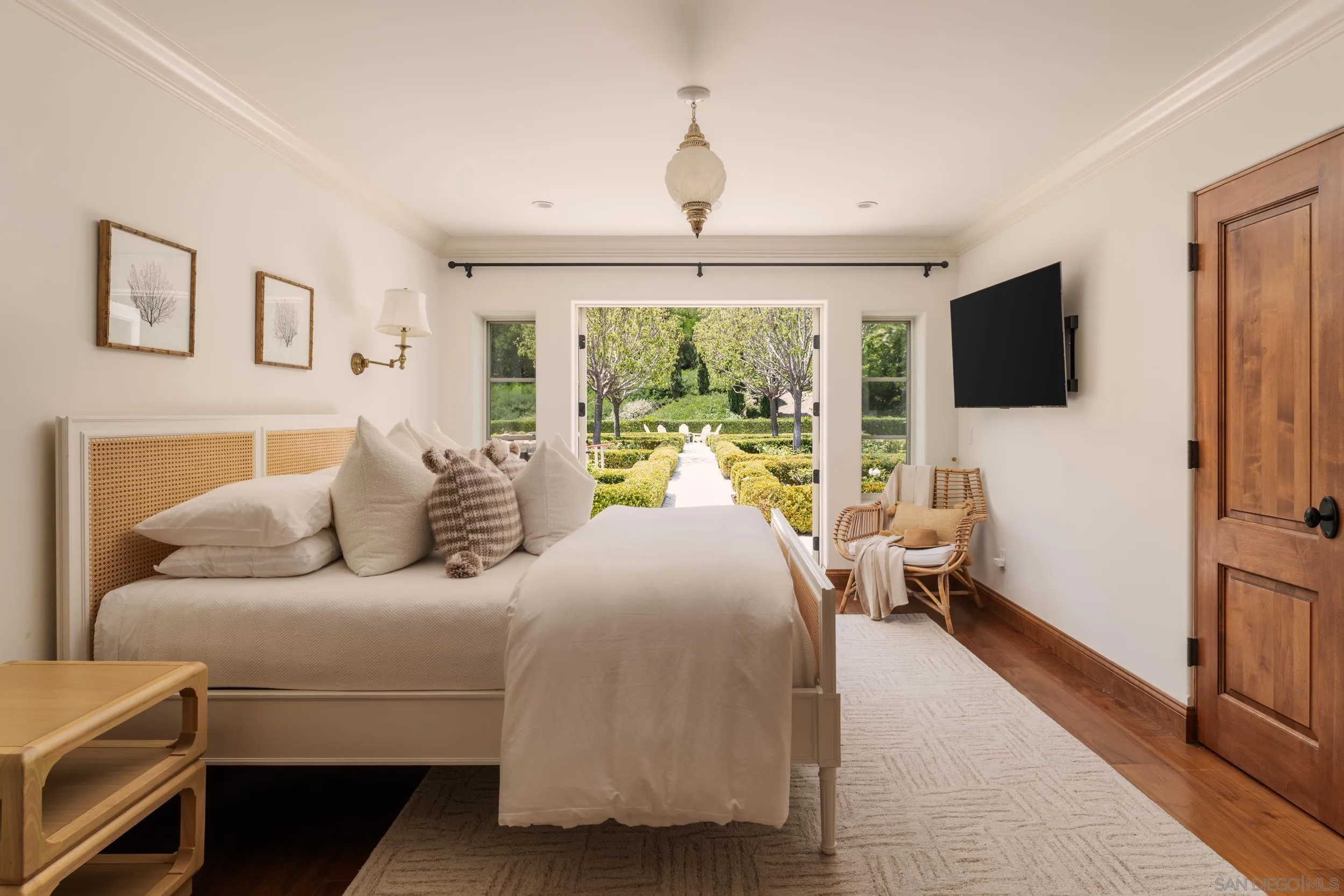 5406 Calzada Del Bosque Rancho Santa Fe, CA 92067 - Photo 14 of 30 a bedroom with a bed and a flat tv screen on dresser