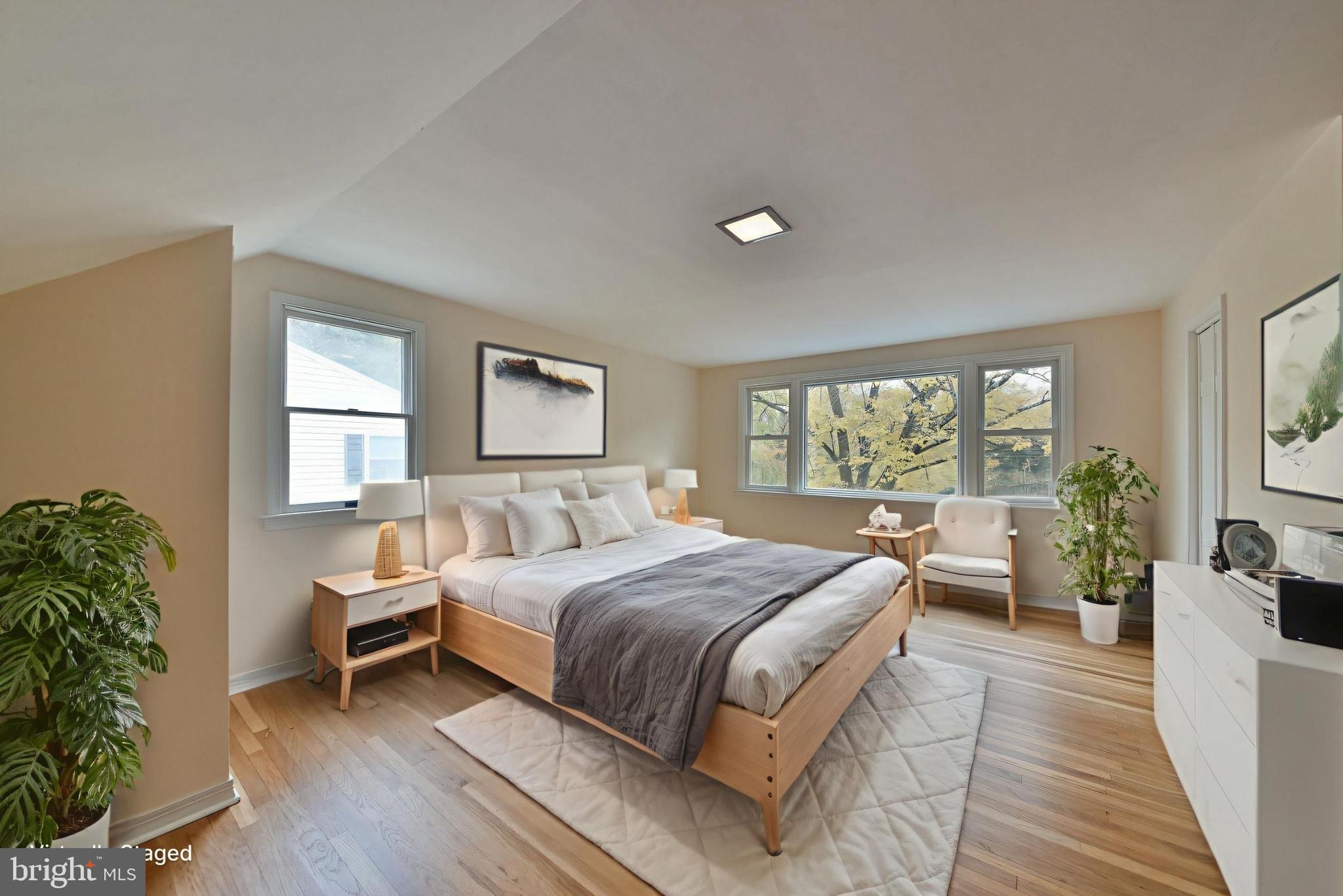 312 East Mill Road Flourtown, PA 19031 - Photo 24 of 36 a bedroom with a large bed and windows