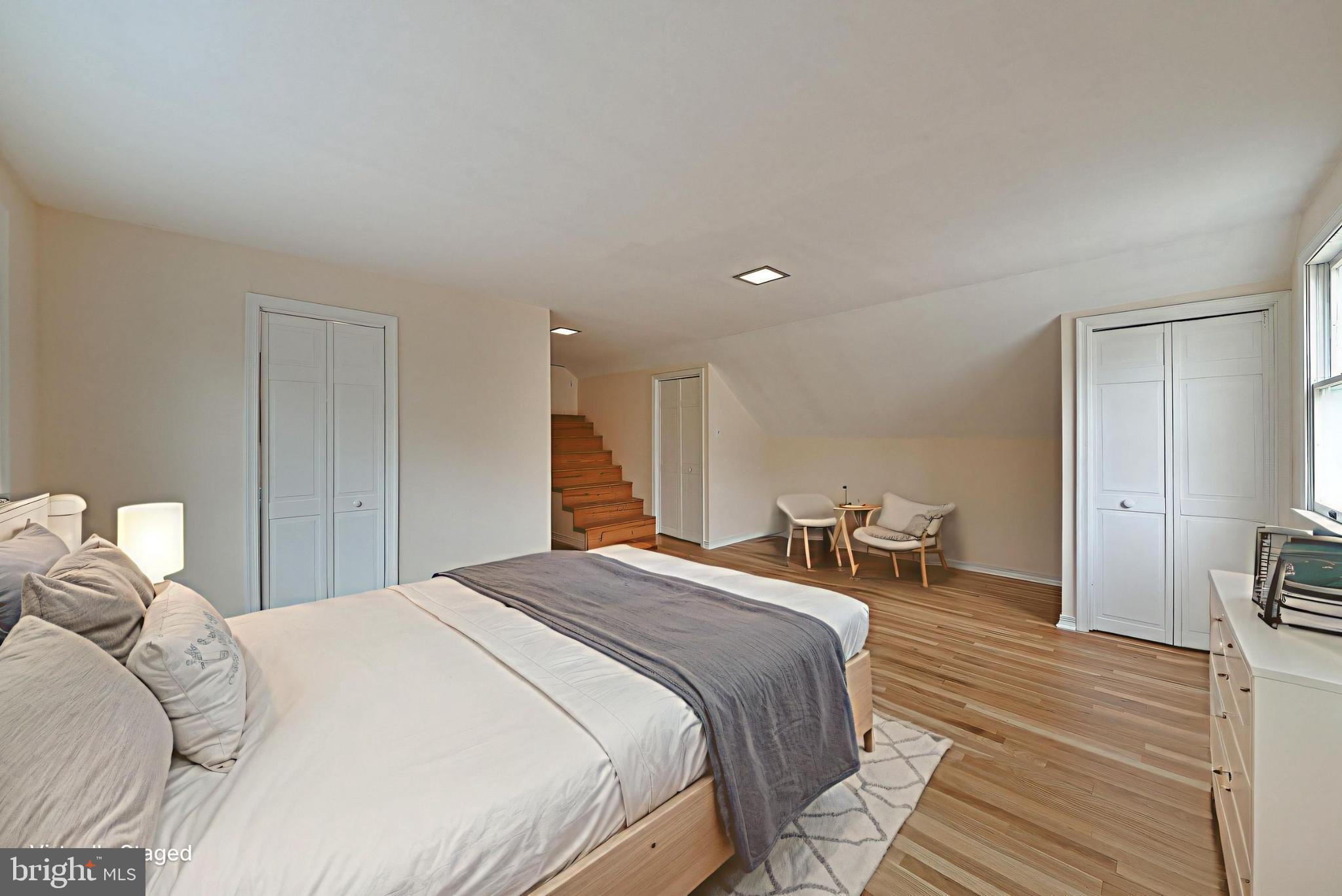 312 East Mill Road Flourtown, PA 19031 - Photo 25 of 36 a bedroom with a bed and wooden floor