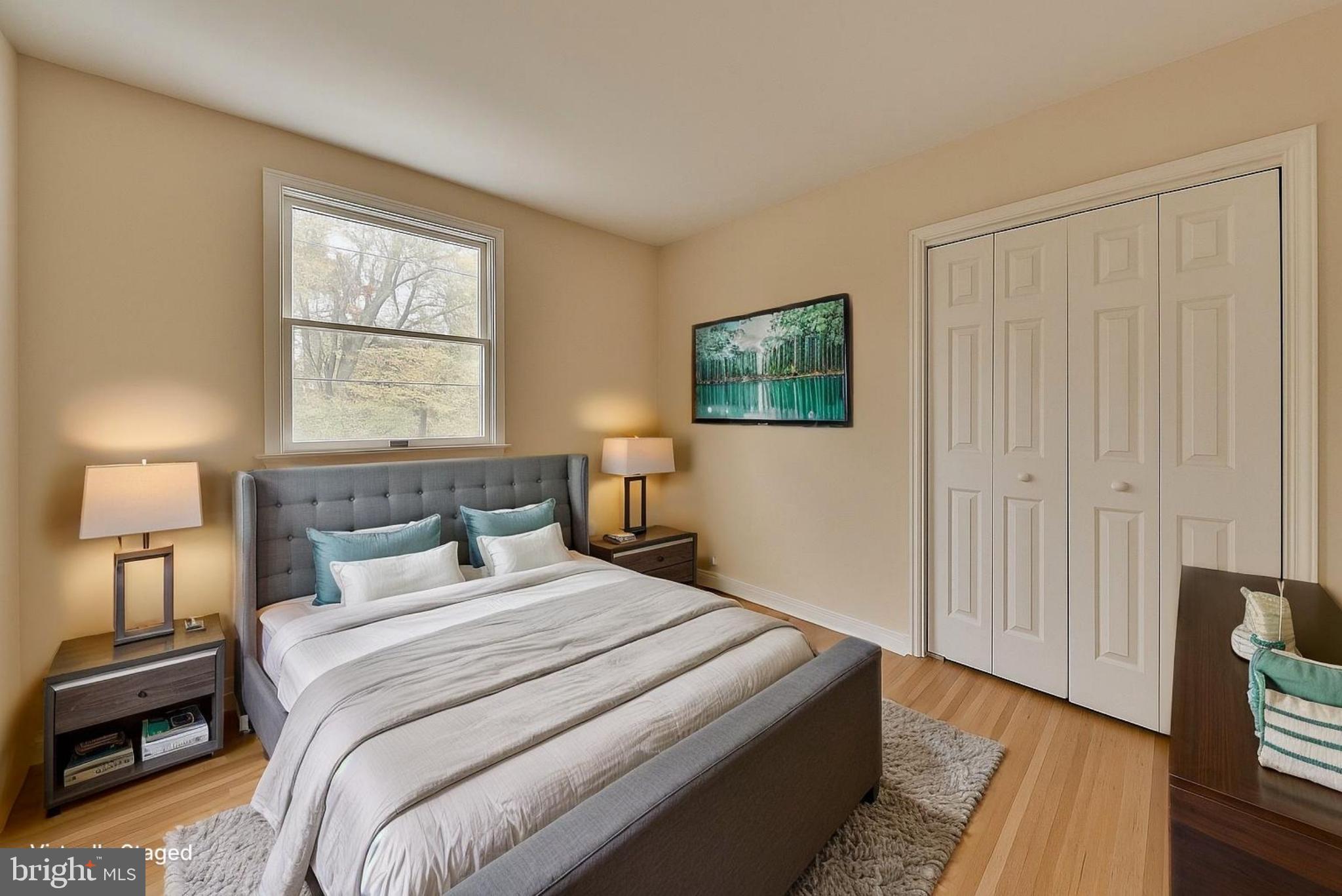 312 East Mill Road Flourtown, PA 19031 - Photo 29 of 36 a bedroom with a bed and a window