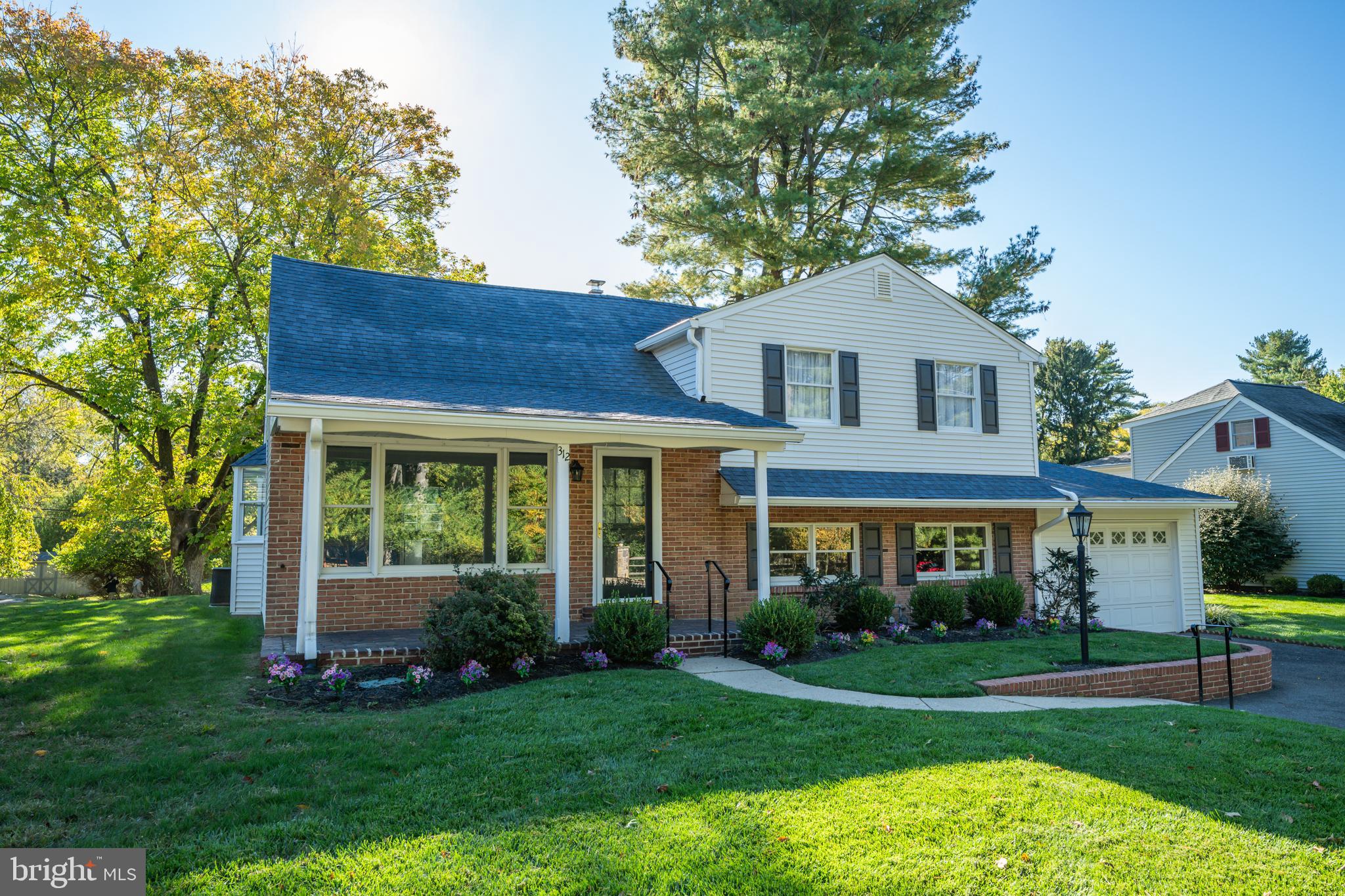 312 East Mill Road Flourtown, PA 19031 - Photo 35 of 36 a front view of a house with a yard