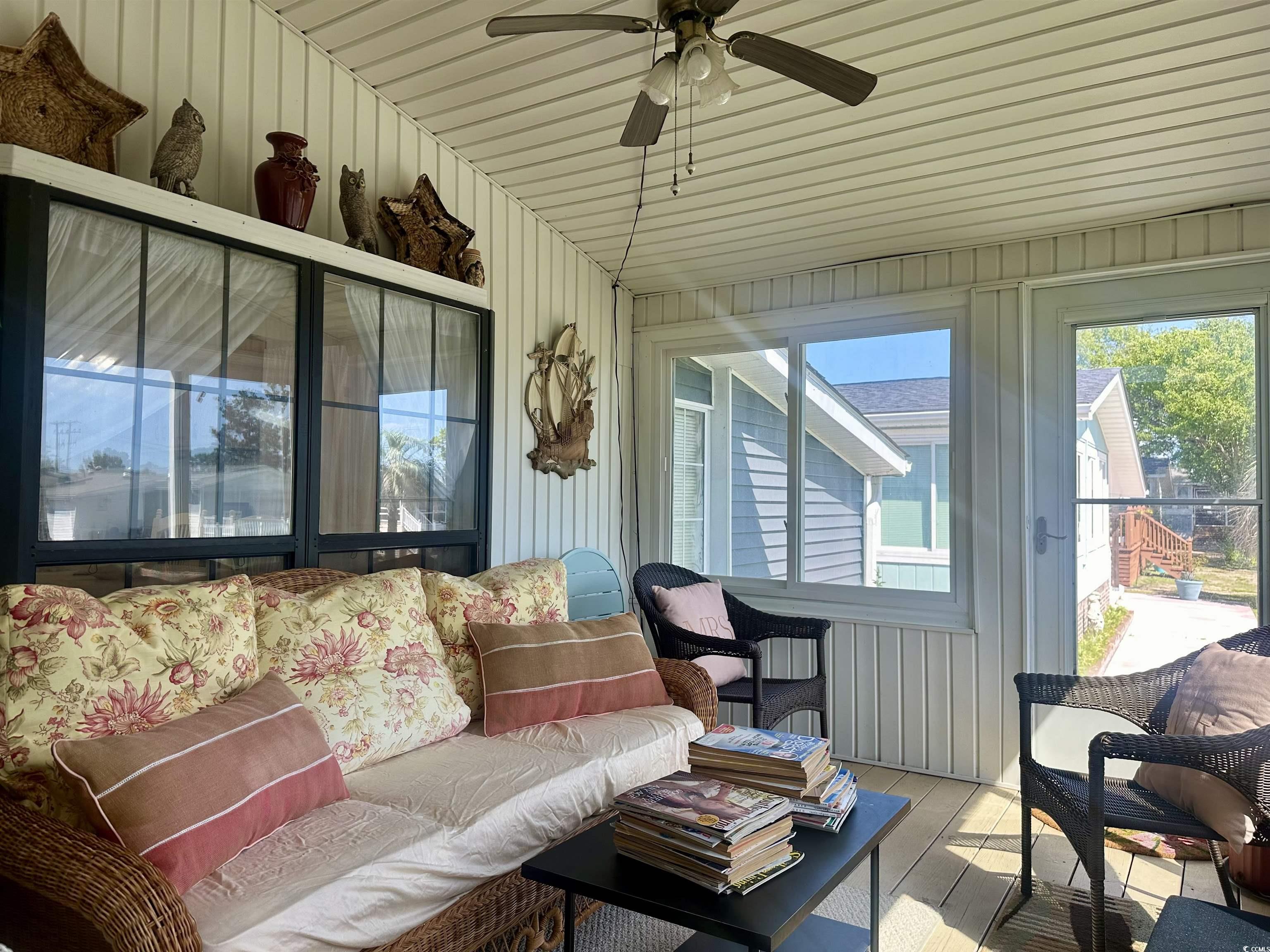 459 Meadowlark Surfside Beach, SC 29575 - Photo 12 of 36 Sunroom / solarium featuring a healthy amount of s