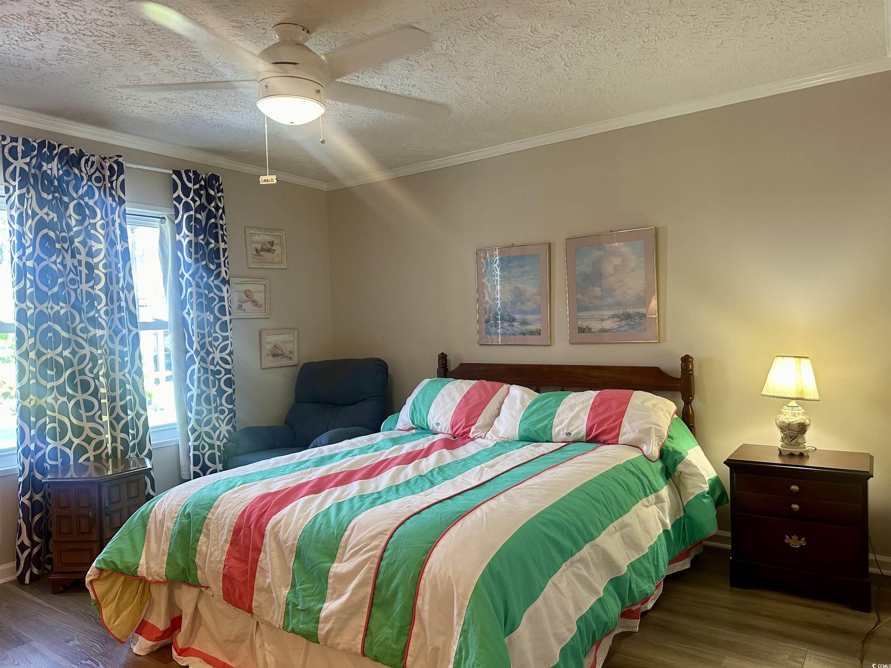 459 Meadowlark Surfside Beach, SC 29575 - Photo 22 of 36 Bedroom with a textured ceiling, ceiling fan, and