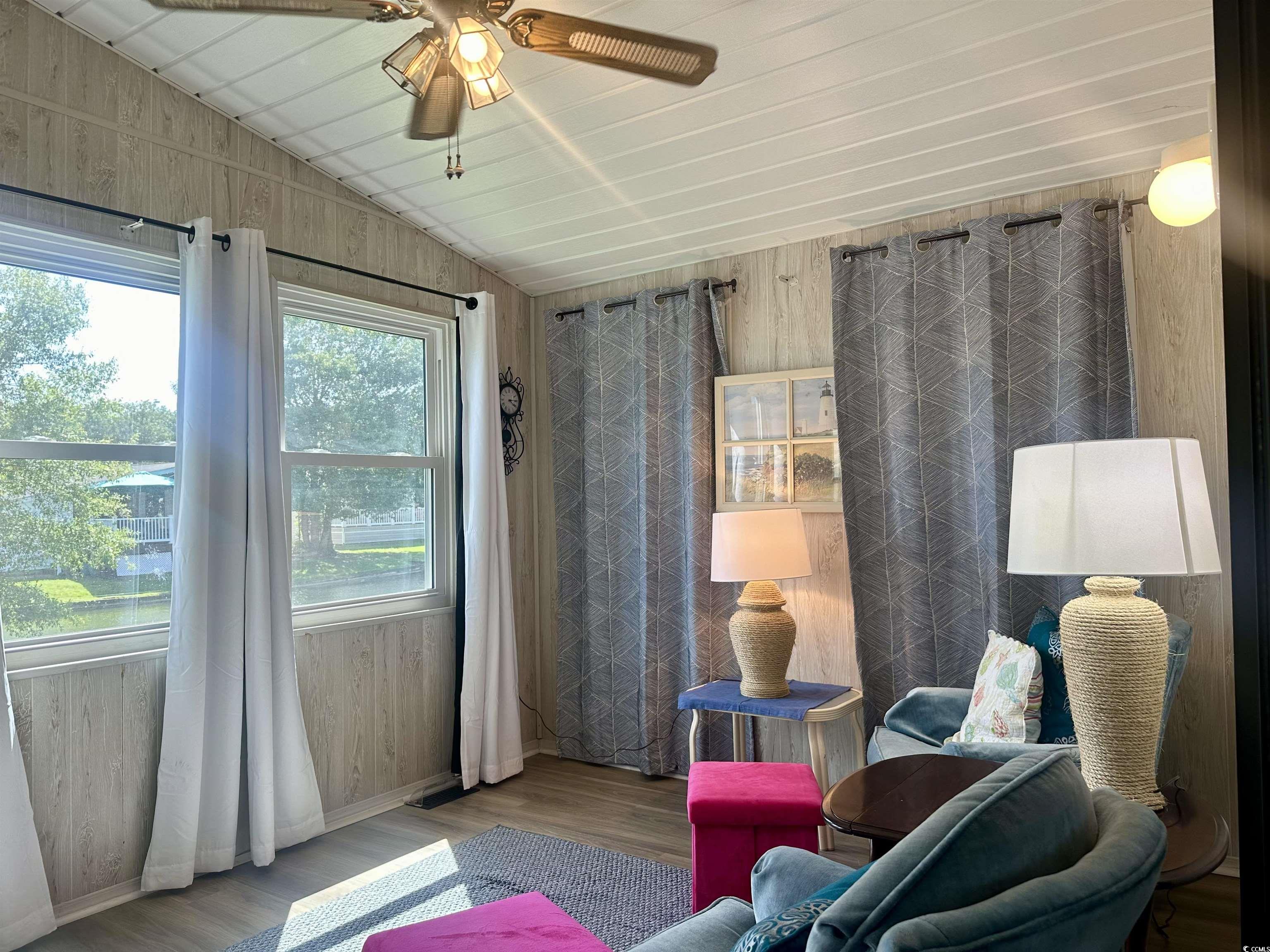 459 Meadowlark Surfside Beach, SC 29575 - Photo 9 of 36 Sitting room with a wealth of natural light, lofte