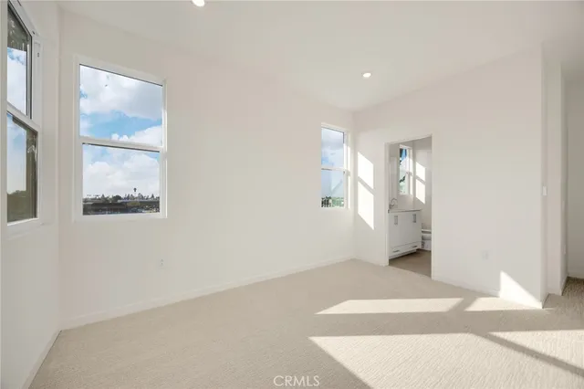a bathroom with a sink double vanity and a mirror