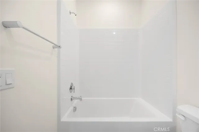 a view of a balcony with chairs