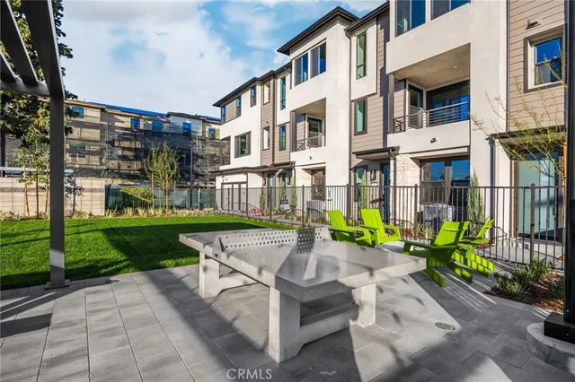 an aerial view of a house with swimming pool
