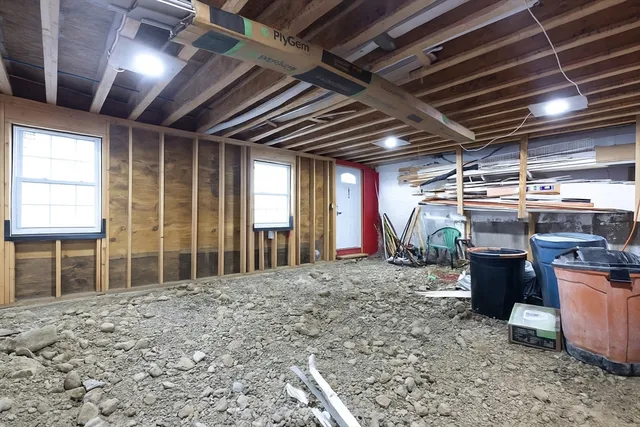 a view of a room with wooden ceiling