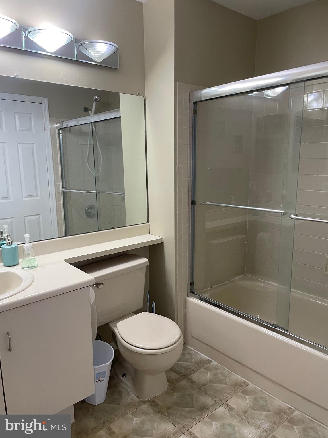 3302 B Ramsbury Court Mount Laurel, NJ 08054 - Photo 7 of 7 a bathroom with a sink a toilet and shower