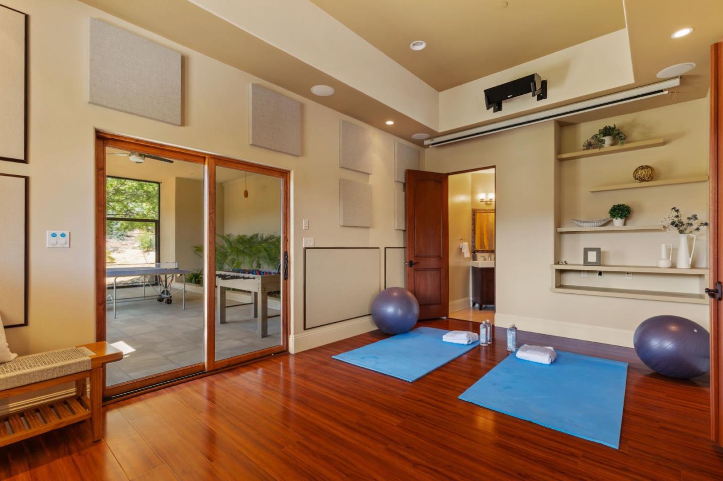 24570 Ruth Lee Court Los Altos, CA 94024 - Photo 28 of 31 a living room with furniture a table and wooden floor