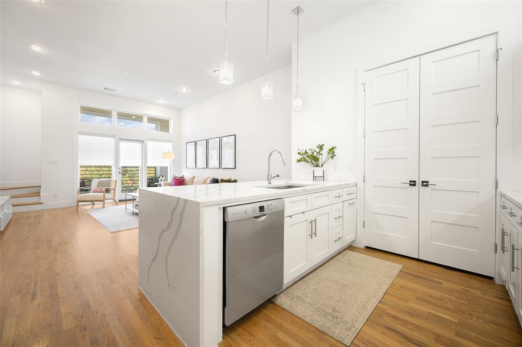 1727 Caddo Street, Unit 103 Dallas, TX 75204 - Photo 14 of 27 a very nice looking room with a large window