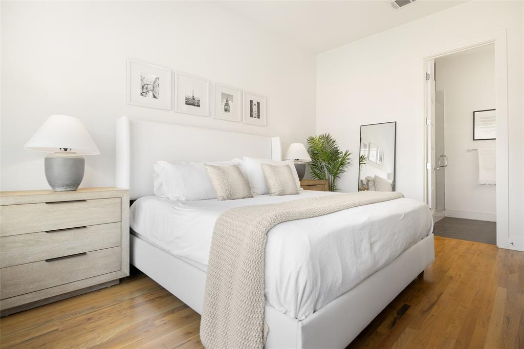 1727 Caddo Street, Unit 103 Dallas, TX 75204 - Photo 19 of 27 a bedroom with a bed and window