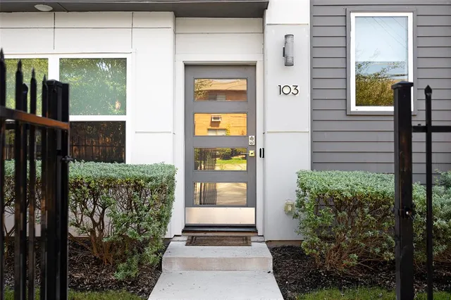 a front view of a house with a porch