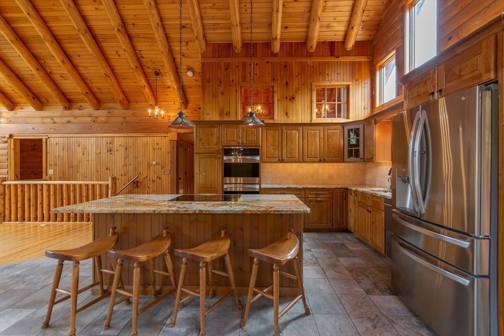56 Waid Road Monson, MA 01057 - Photo 7 of 41 a kitchen with a table and chairs