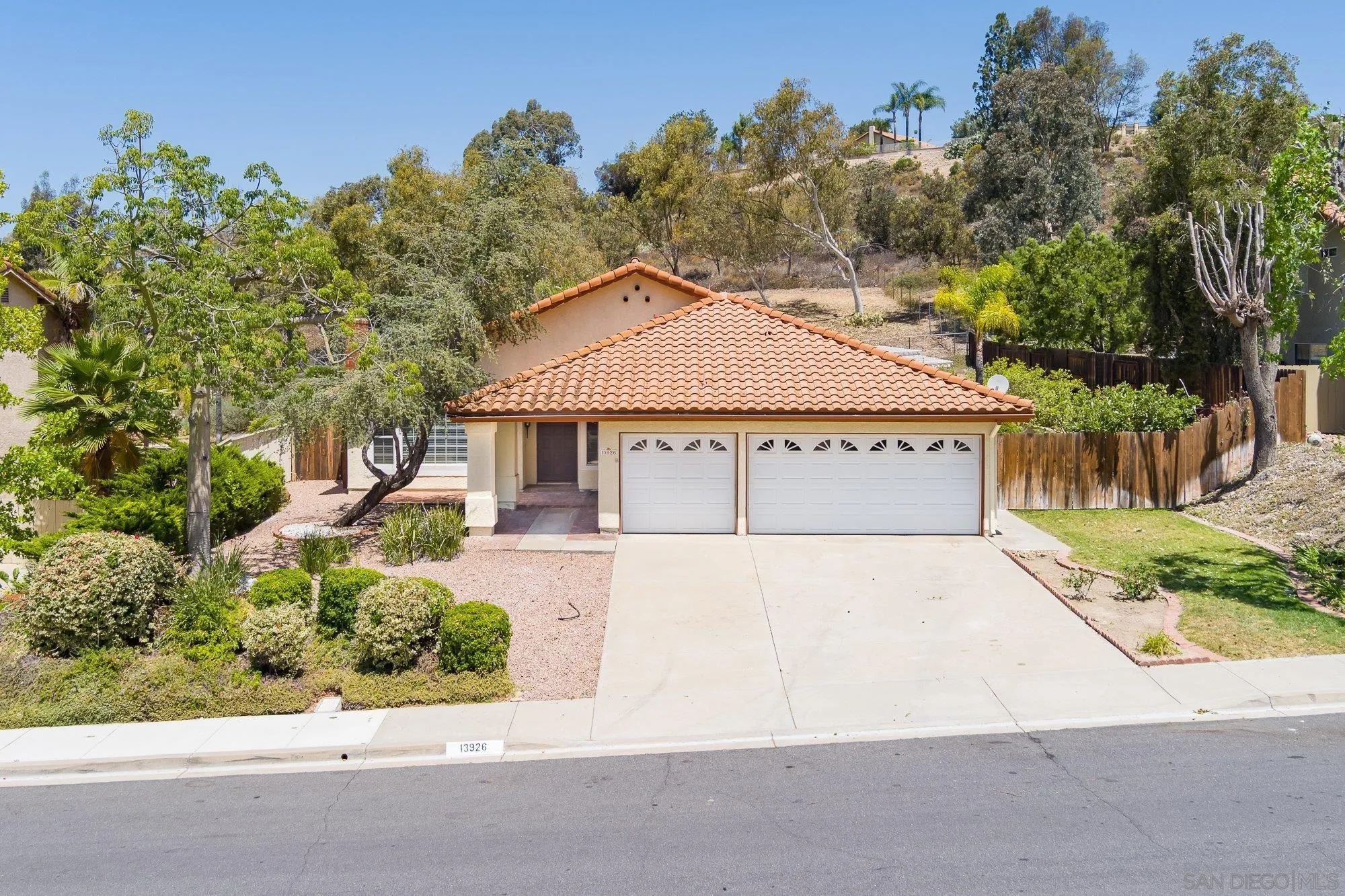 13926 Carriage Road Poway, CA 92064 - Photo 1 of 54 front view of a house with a yard