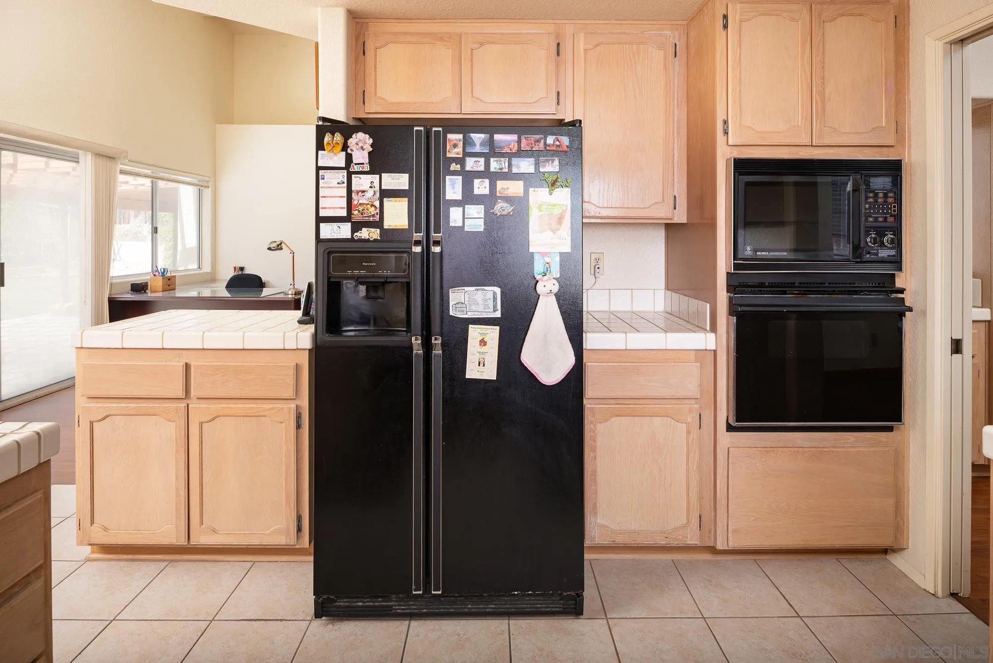 13926 Carriage Road Poway, CA 92064 - Photo 15 of 54 a kitchen with stainless steel appliances granite countertop a refrigerator and a stove