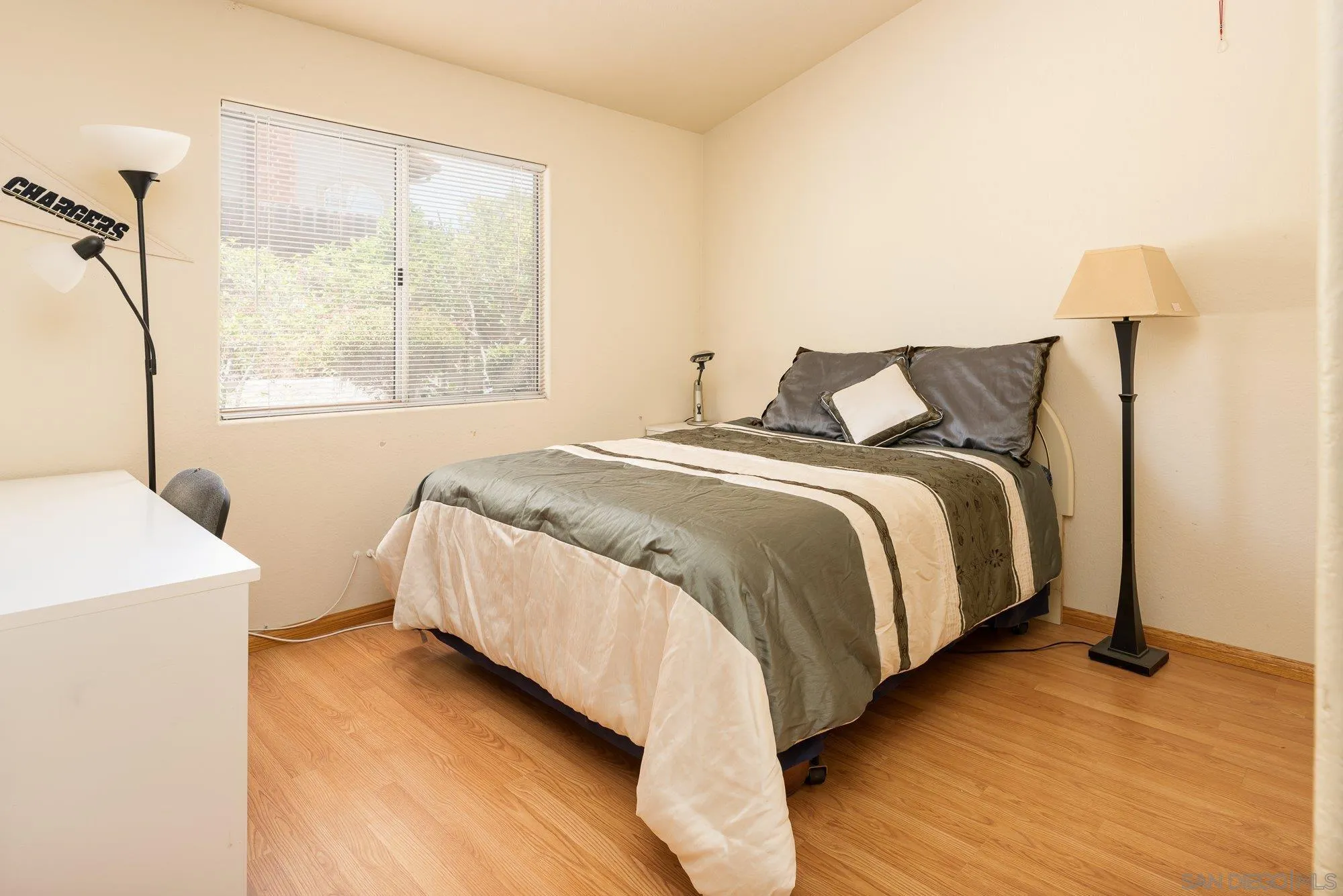 13926 Carriage Road Poway, CA 92064 - Photo 22 of 54 a bed sitting in a bedroom next to a window
