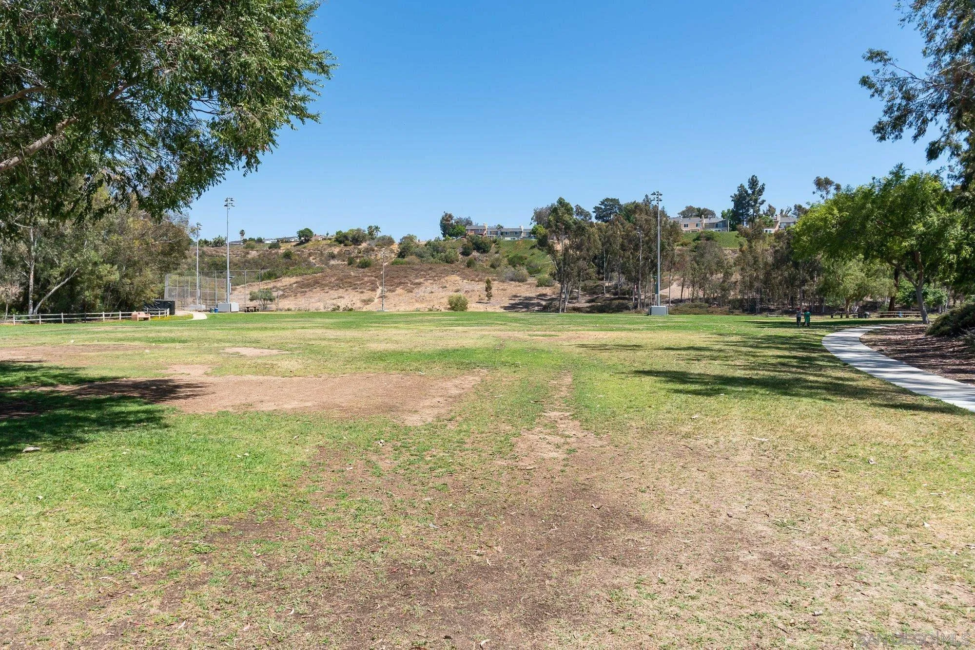 13926 Carriage Road Poway, CA 92064 - Photo 54 of 54 a view of a lake with a yard