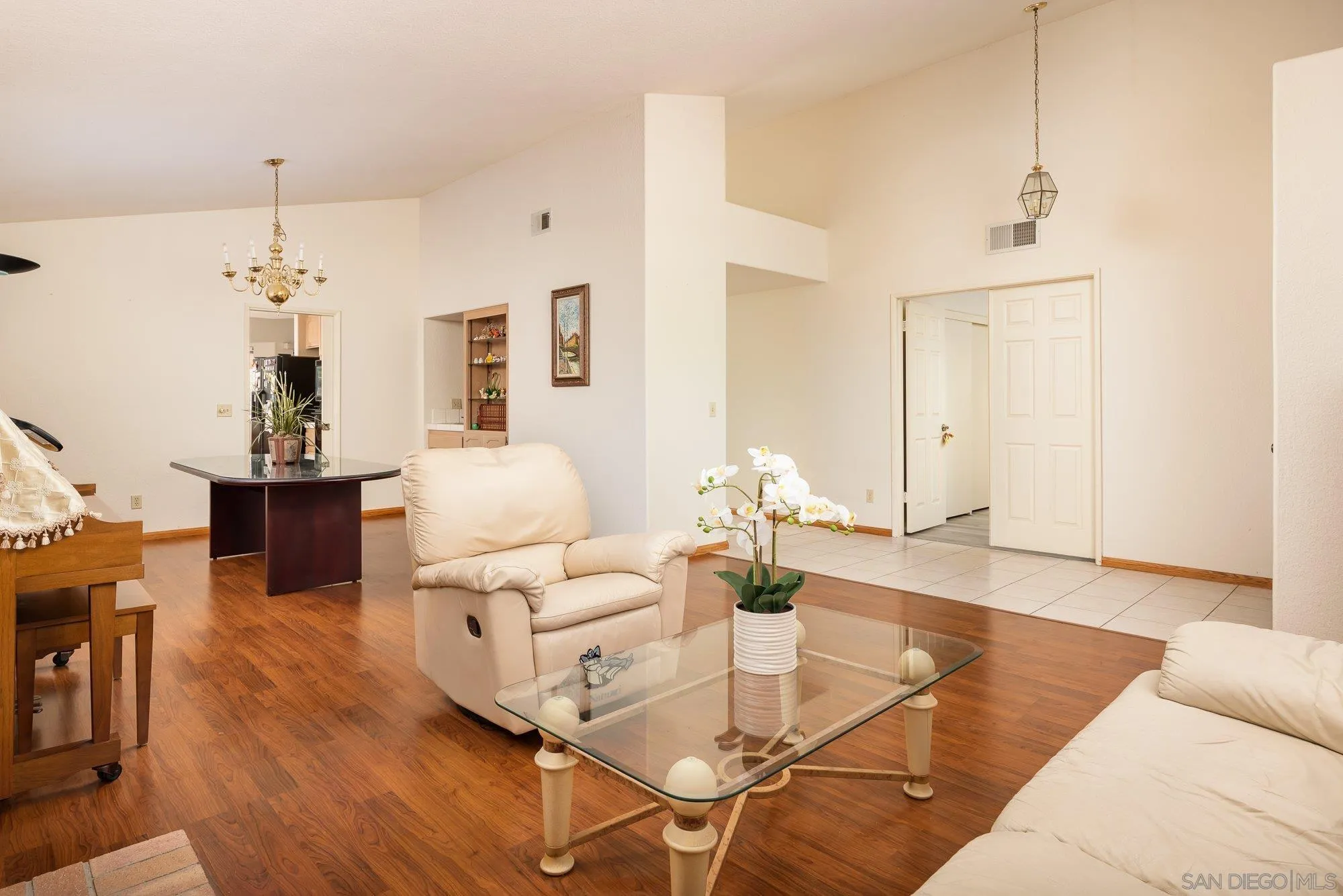 13926 Carriage Road Poway, CA 92064 - Photo 7 of 54 a living room with furniture and wooden floor