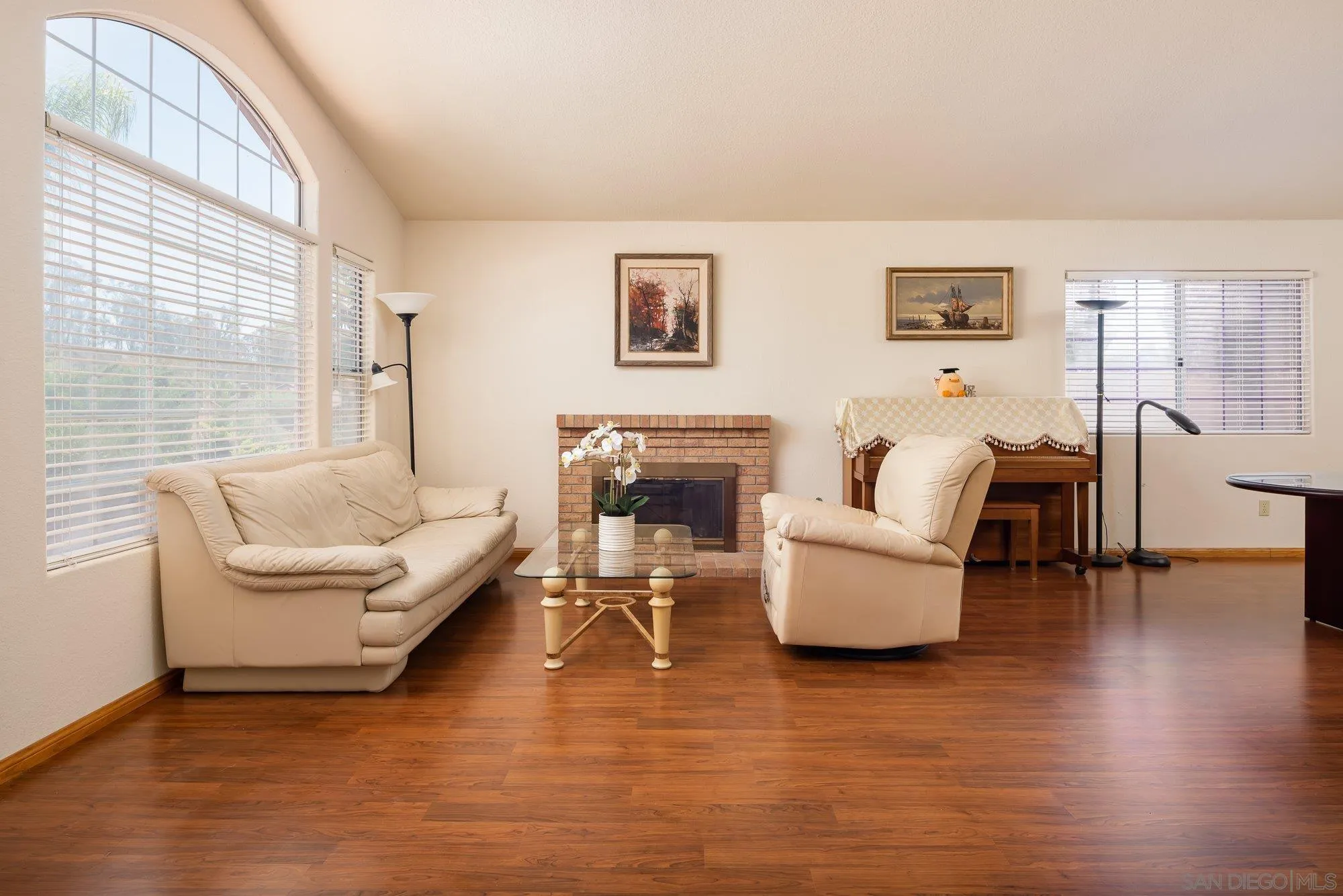 13926 Carriage Road Poway, CA 92064 - Photo 8 of 54 a living room with furniture and a fireplace