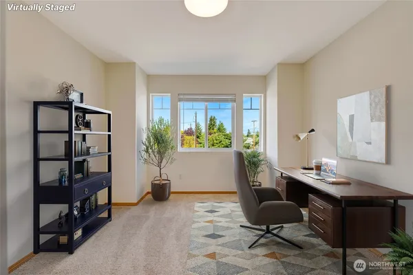 a workspace with furniture and window