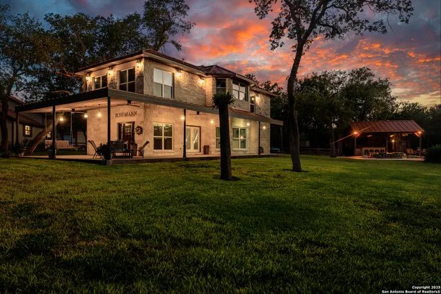 a front view of a building with garden
