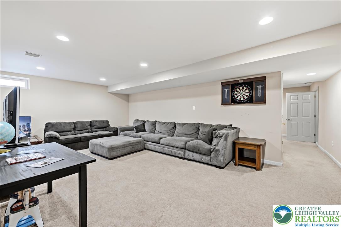 130 Lower Way Road Easton, PA 18045 - Photo 44 of 56 a living room with couches and a flat screen tv