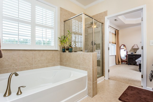 1144 Chapanoke Road Raleigh, NC 27603 - Photo 14 of 22 Master bath has a separate shower and garden tub with tile surround. Master Bath/Spa