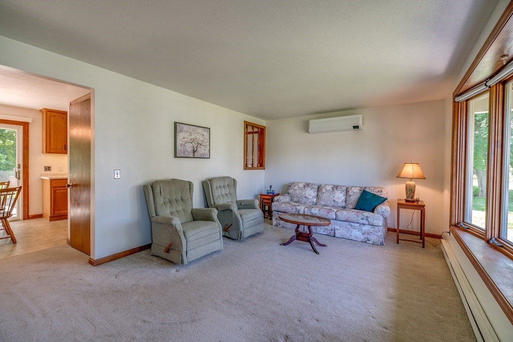 972 Florence Road Northampton, MA 01062 - Photo 6 of 36 a living room with furniture and a lamp