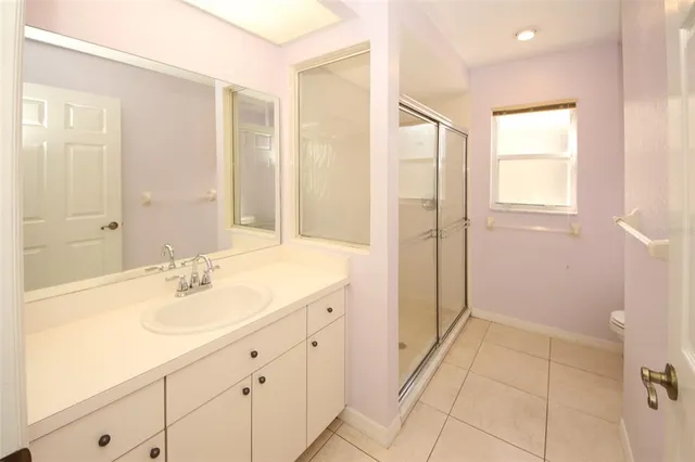 a room with a sink cabinets and utility room