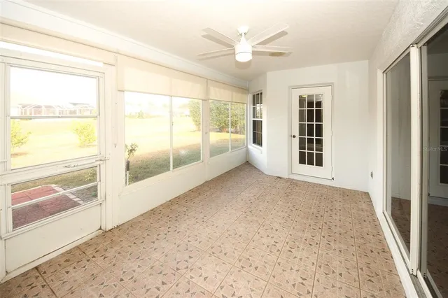 a view of an empty room and window
