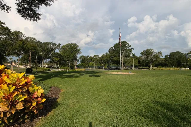 a room with gym equipment and a large window
