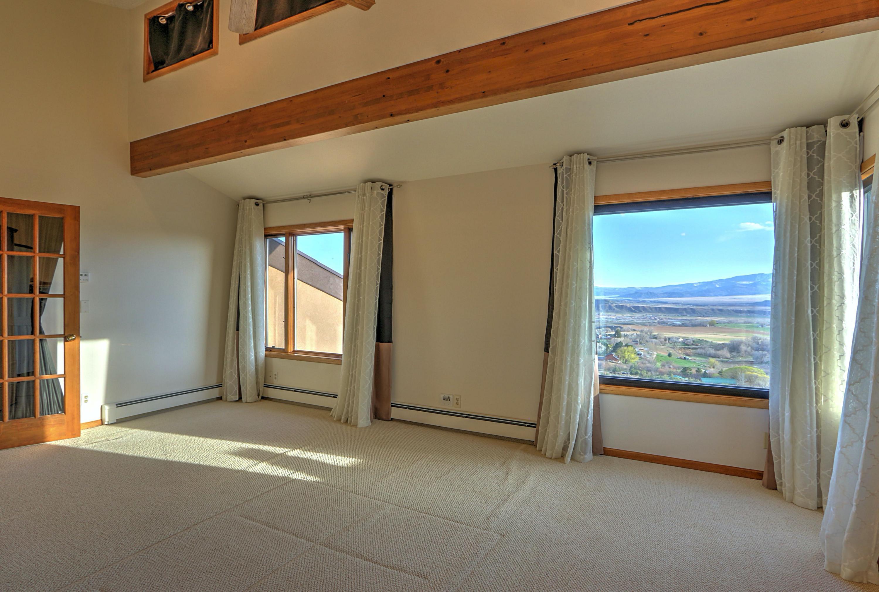 534 Panoramic Drive Silt, CO 81652 - Photo 17 of 48 a view of an empty room with a window