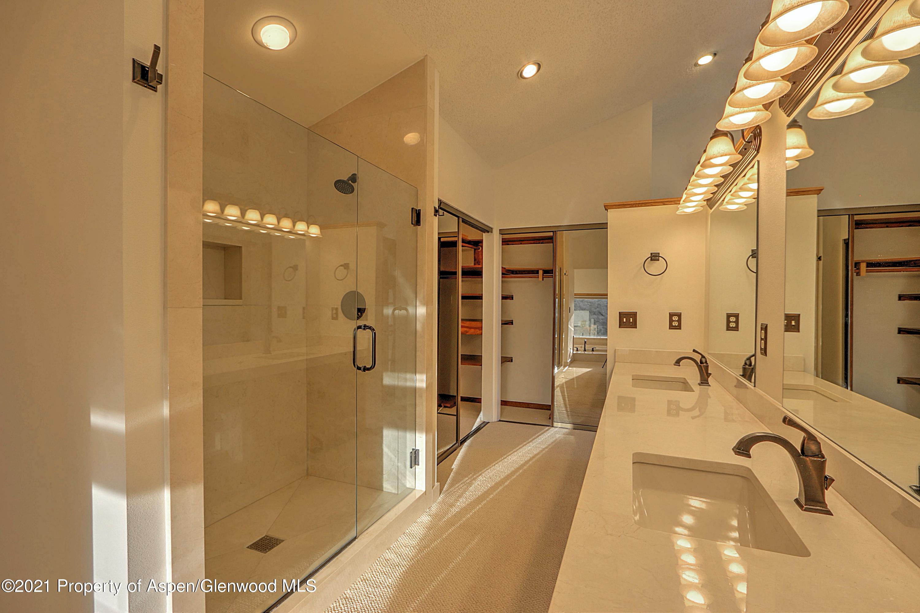 534 Panoramic Drive Silt, CO 81652 - Photo 18 of 48 a spacious bathroom with a tub shower and sink
