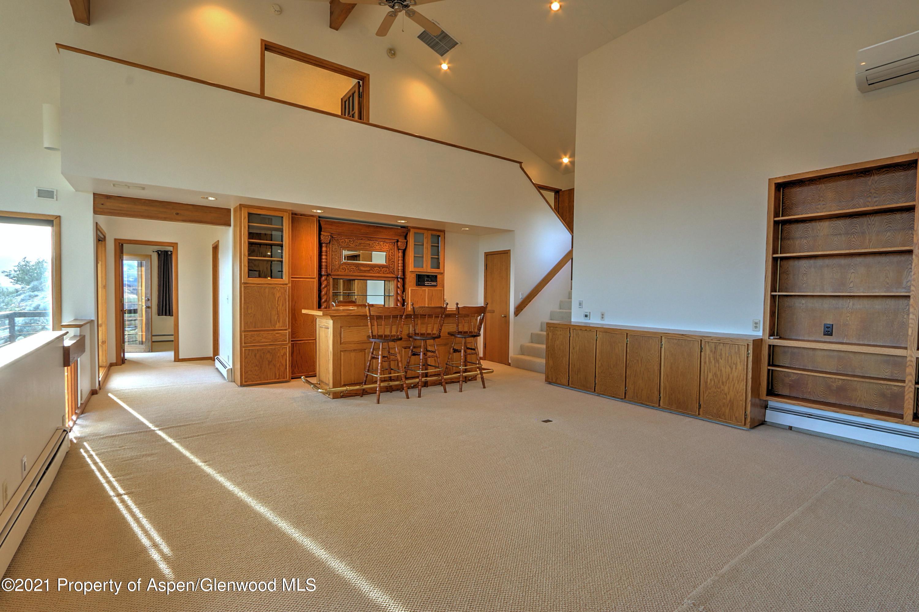 534 Panoramic Drive Silt, CO 81652 - Photo 25 of 48 a room with furniture and wooden floor