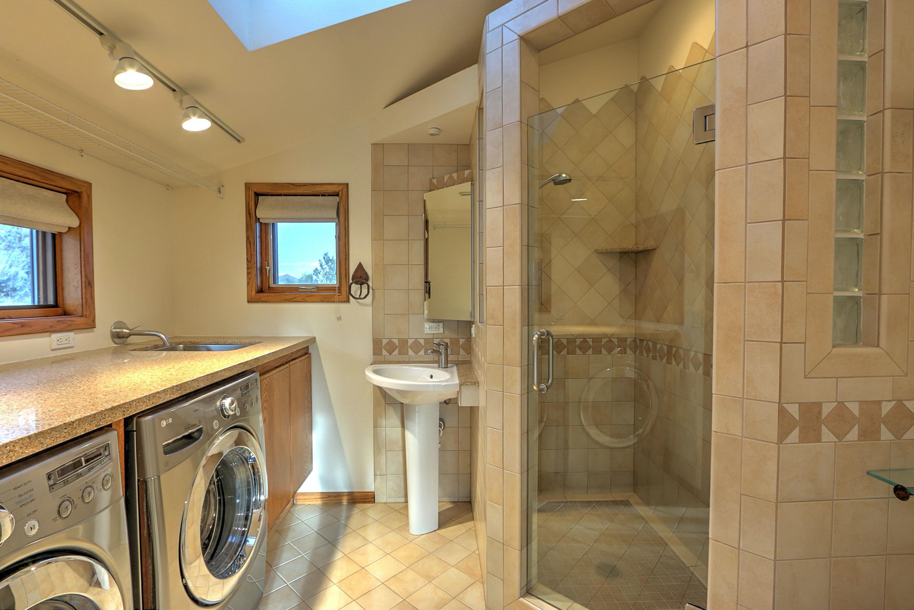 534 Panoramic Drive Silt, CO 81652 - Photo 34 of 48 a bathroom with a sink a toilet and shower