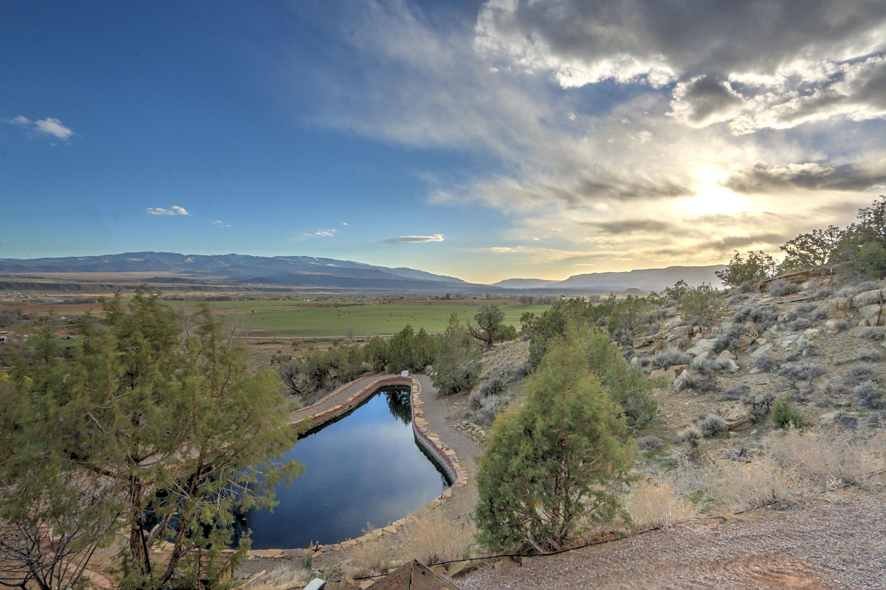 534 Panoramic Drive Silt, CO 81652 - Photo 37 of 48 a view of a lake with a mountain in the background