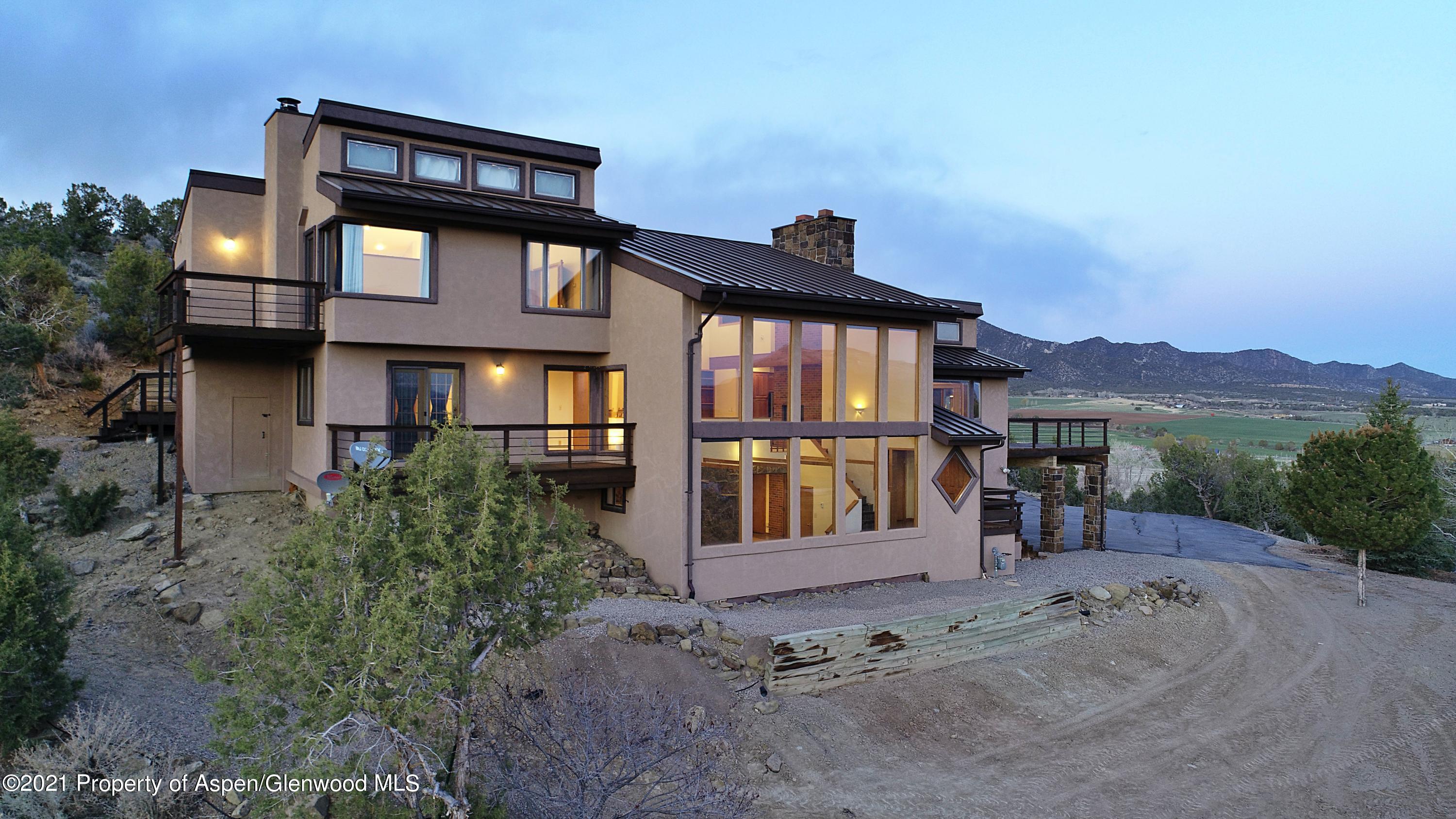 534 Panoramic Drive Silt, CO 81652 - Photo 7 of 48 a front view of a house with a yard