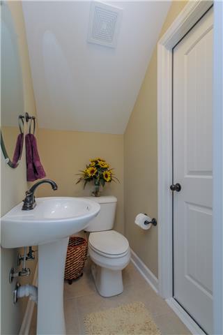 106 Legends Ridge Drive Lebanon, TN 37090 - Photo 13 of 19 Half bathroom upstairs.