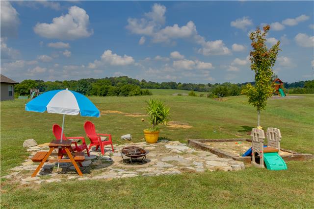 106 Legends Ridge Drive Lebanon, TN 37090 - Photo 18 of 19 Fire pit area and sandbox.