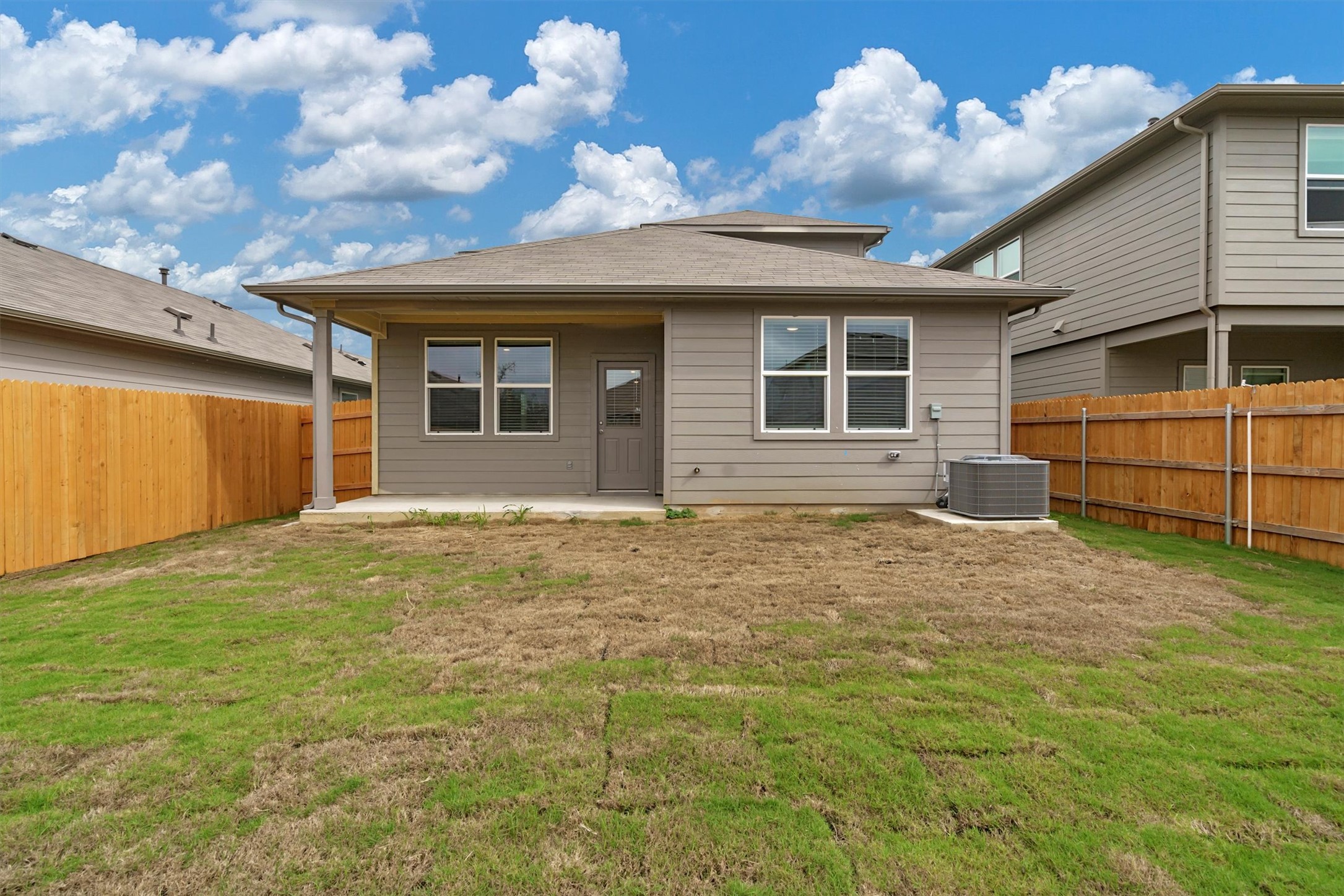 2909 Tweedy Trail Pflugerville, TX 78660 - Photo 24 of 27 A spacious backyard awaits, ideal for outdoor living and recreation.