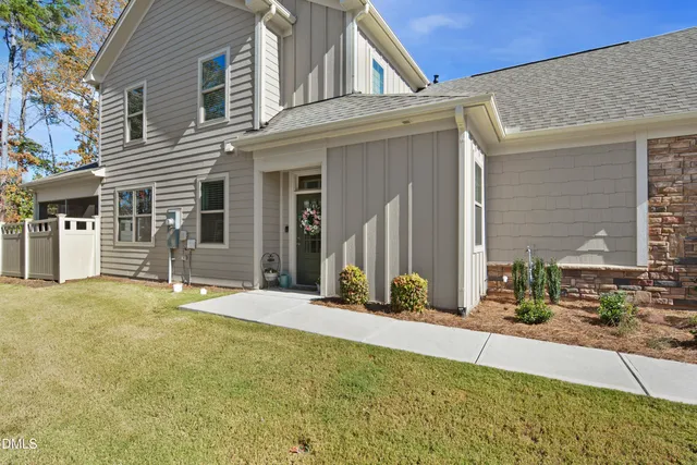 a front view of a house with a patio