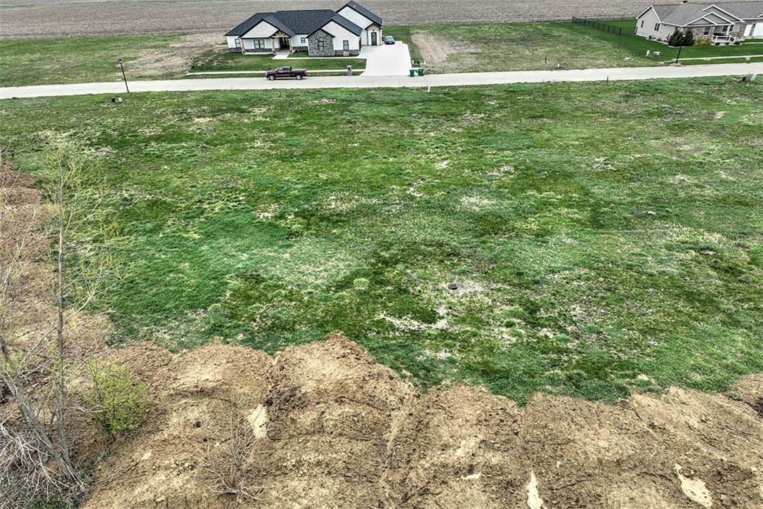 164 Shadow Ridge Boulevard Forsyth, IL 62535 - Photo 5 of 6 a view of yard with swimming pool and green space