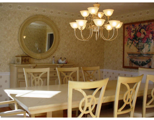 73 Azalea Road Sharon, MA 02067 - Photo 5 of 22 a view of a dining room with furniture and chandelier