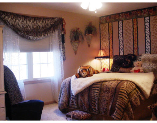 73 Azalea Road Sharon, MA 02067 - Photo 10 of 22 a bedroom with a bed and a window