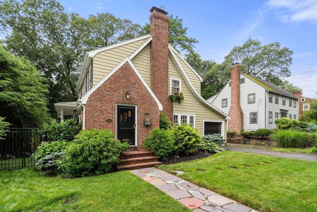 14 Sunset Road Wellesley, MA 02482 - Photo 1 of 39 a front view of house with yard and green space